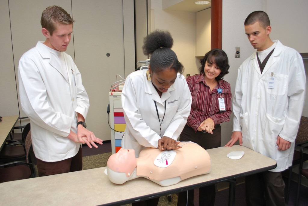 Students learning CPR