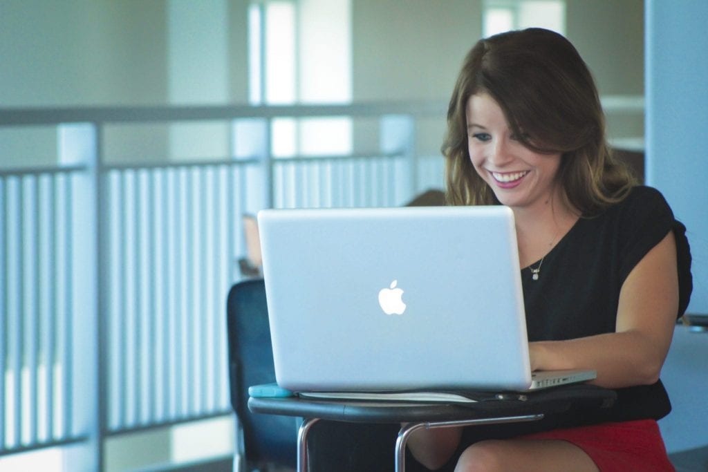 Student using laptop at Langston University. 