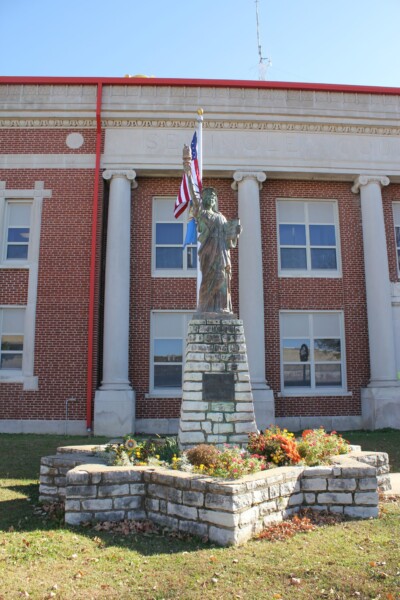 Wewoka Public Schools Building and Statue