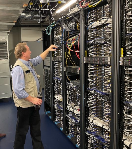 Stephen Wheat with ORU's Titan Supercomputer