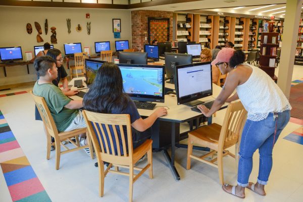Teenage customers using computers at Tulsa City-County Library