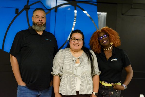 Lee Diamond, Wang Yang, Teresa Broughton-Anderson in OneNet's data center 