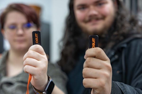 Two students carrying OSUIT tags