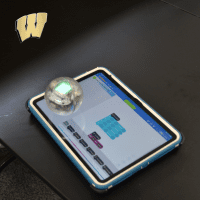 Woodward logo, tablet with a sphere drone.