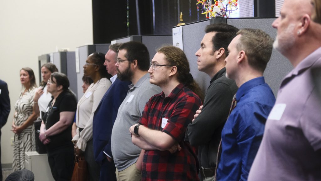Various subscribers on tour of the Network Operations Center